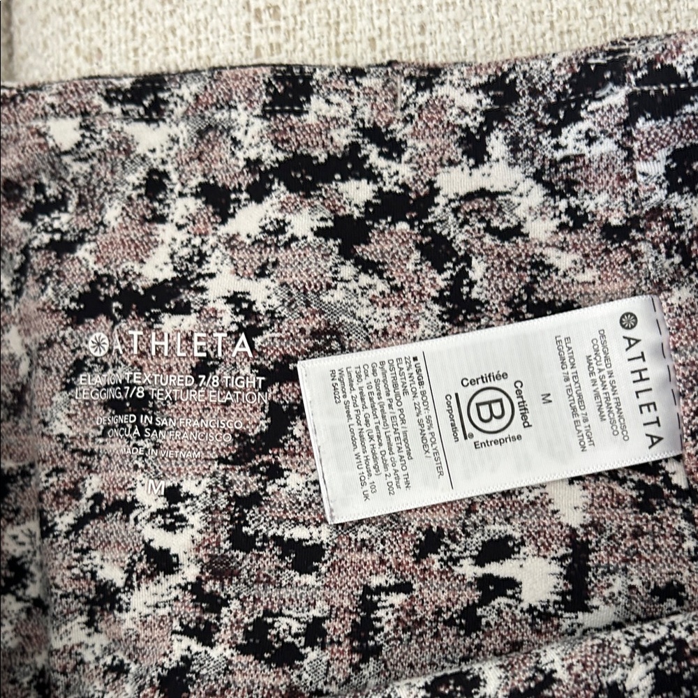 Athleta Elation 7/8 Leggings in Black, White, and Pink - Picture 3 of 3